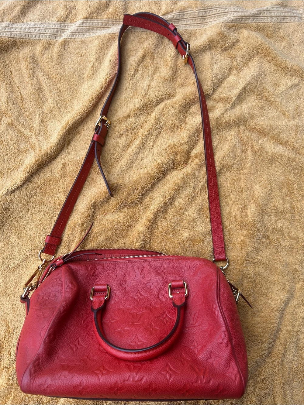Louis Vuitton Speedy 25 Bandouliere in Monogram Empreinte Leather in Cherry Red